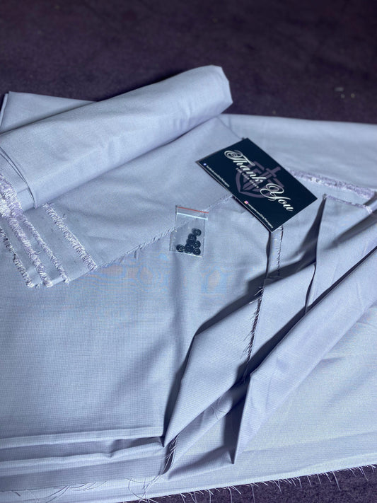 White shirt with a brand label on a dark background